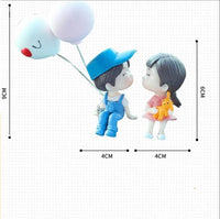 Pareja con globo